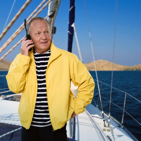 Guy talking on a boat on a Iridium Extreme 9575 Satellite Phone