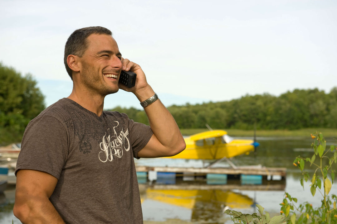 Guy talking on Iridium 9555 satellite phone